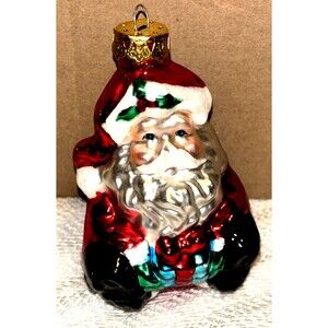 Vintage Sitting SANTA CLAUS Holding a Wrapped Gift Box Glass Ornament